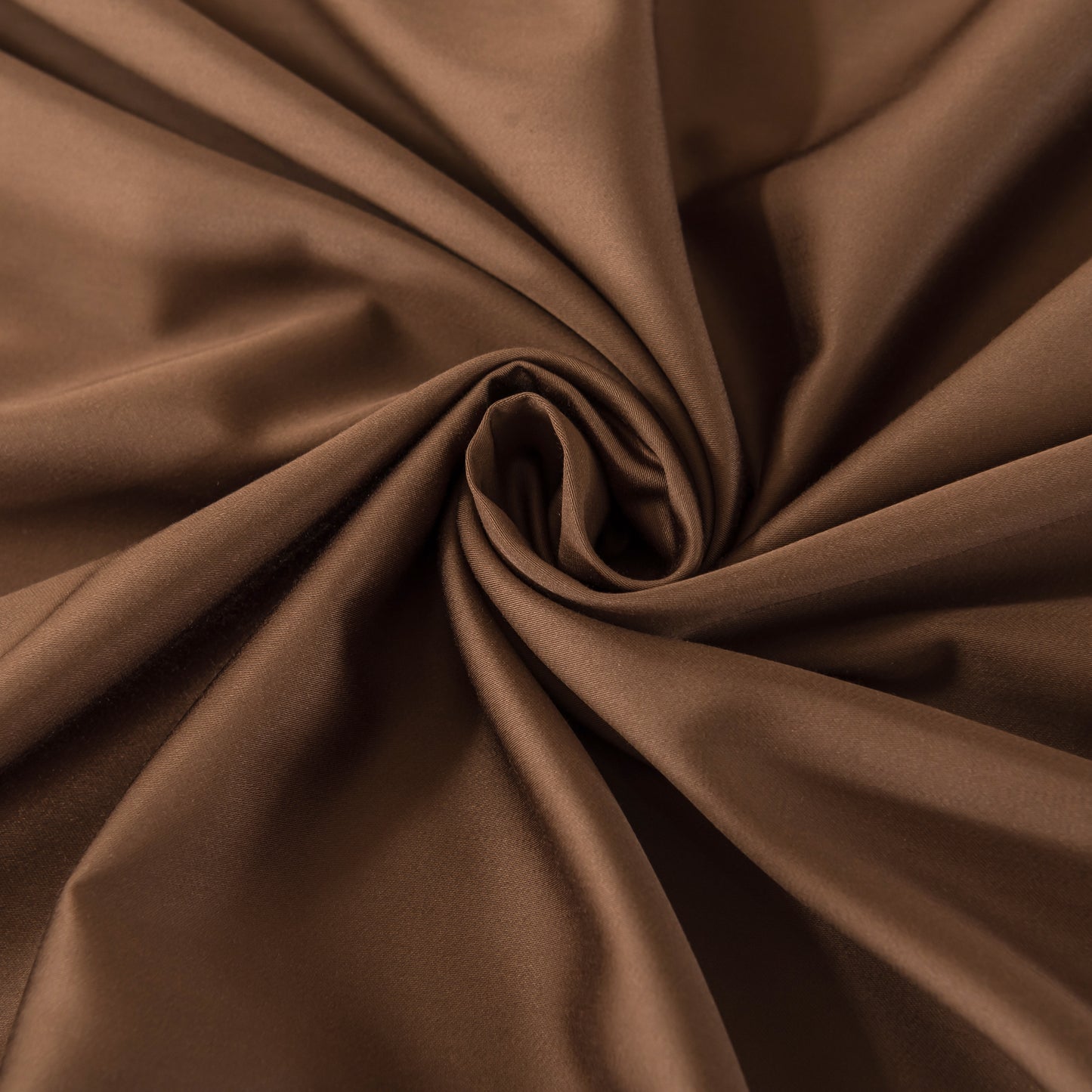 Close-up of brown bamboo fabric with folds