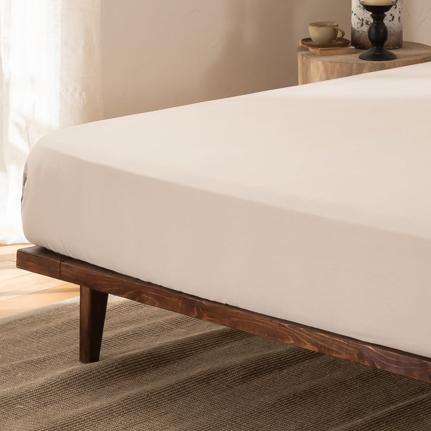 Bedroom with bamboo fitted sheet in beige colour