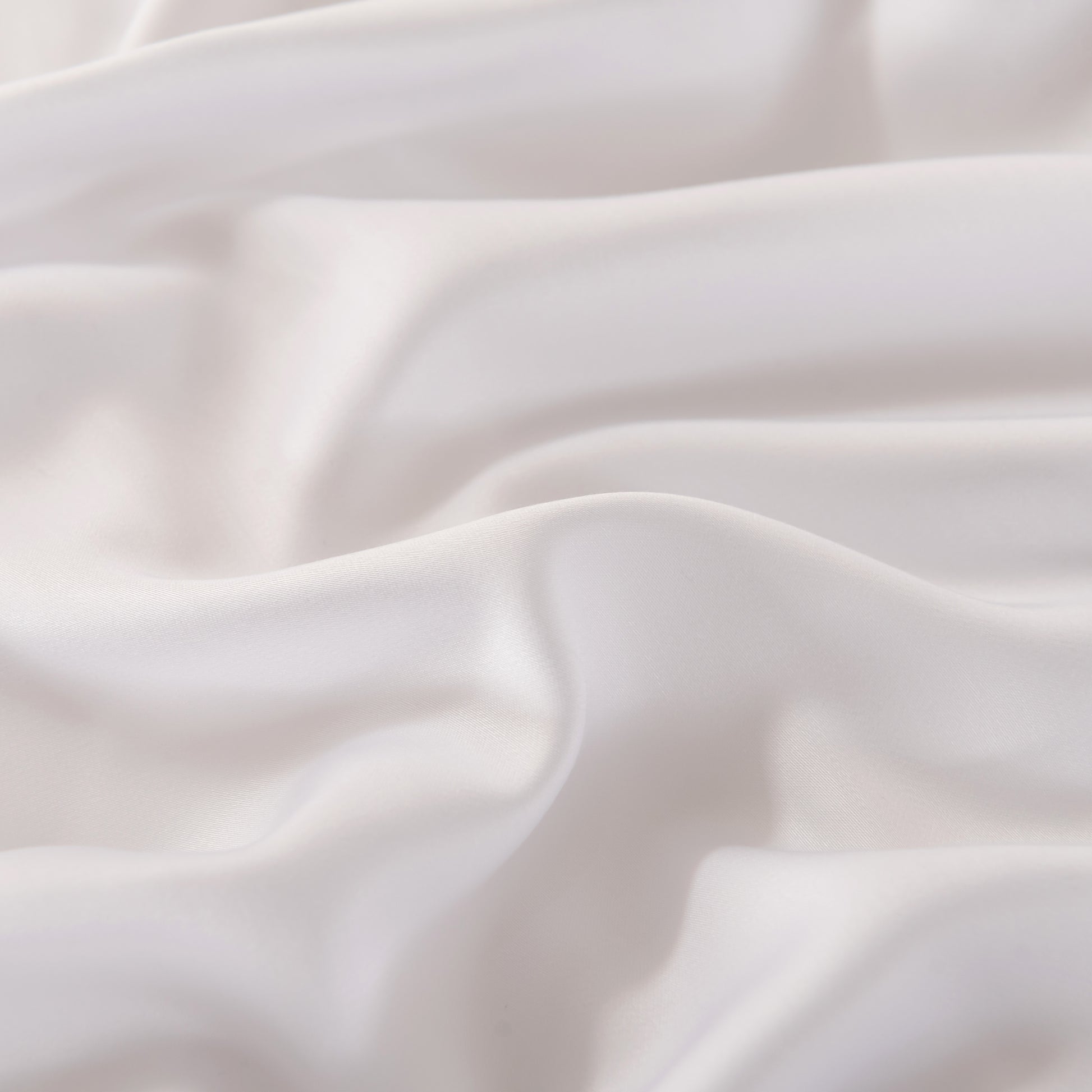 Close-up of white bamboo fabric with soft folds