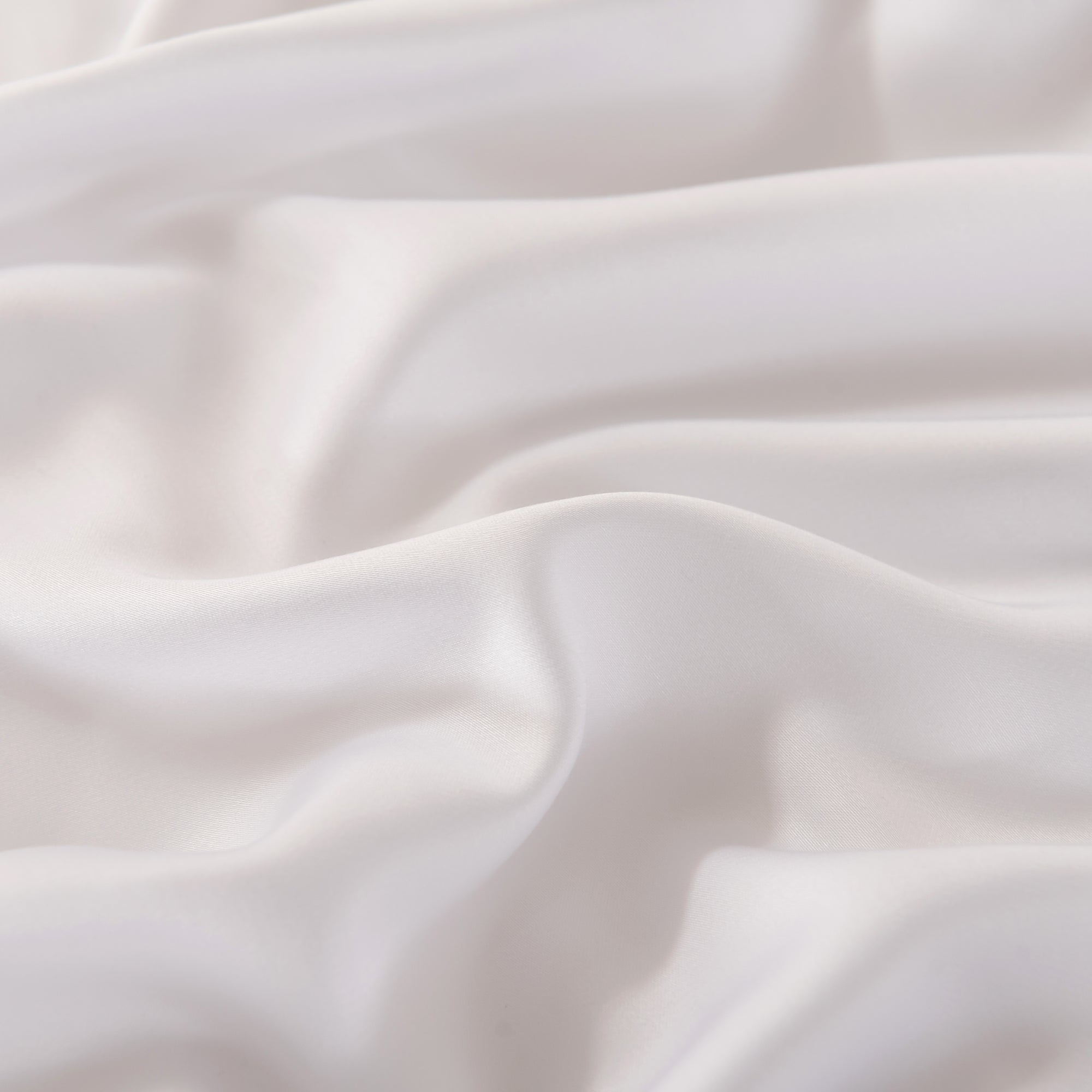 Close-up of white bamboo fabric with soft folds