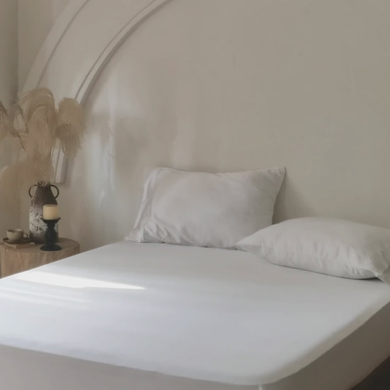 Luxury white bamboo fitted sheet with silky-soft finish.