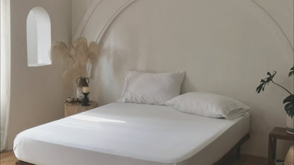 Luxury white bamboo fitted sheet with silky-soft finish.