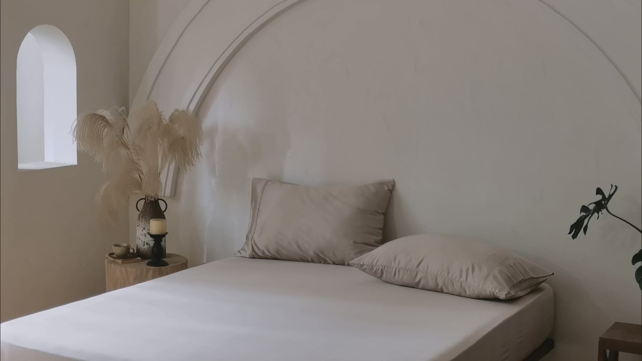 Luxury sand bamboo fitted sheet with breathable temperature-regulating fabric.