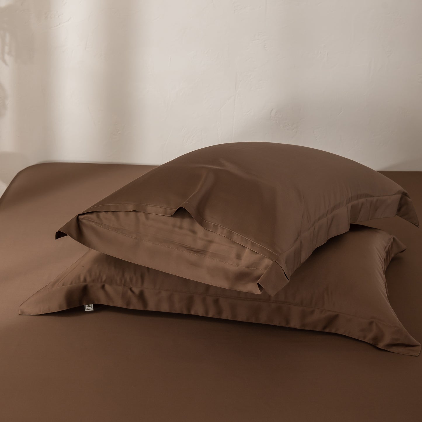 Breathable cocoa bamboo pillowcases designed for year-round comfort.